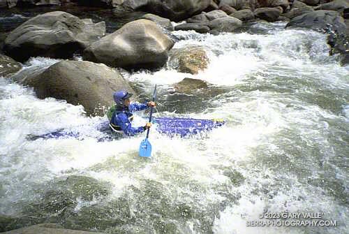 Gary Gunder works his way through a maze of boulders on the Forks at low water, somewhere below Four Mile rapid.
